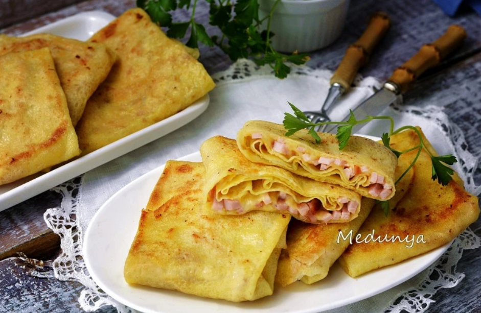 Млинці з шинкою і сиром